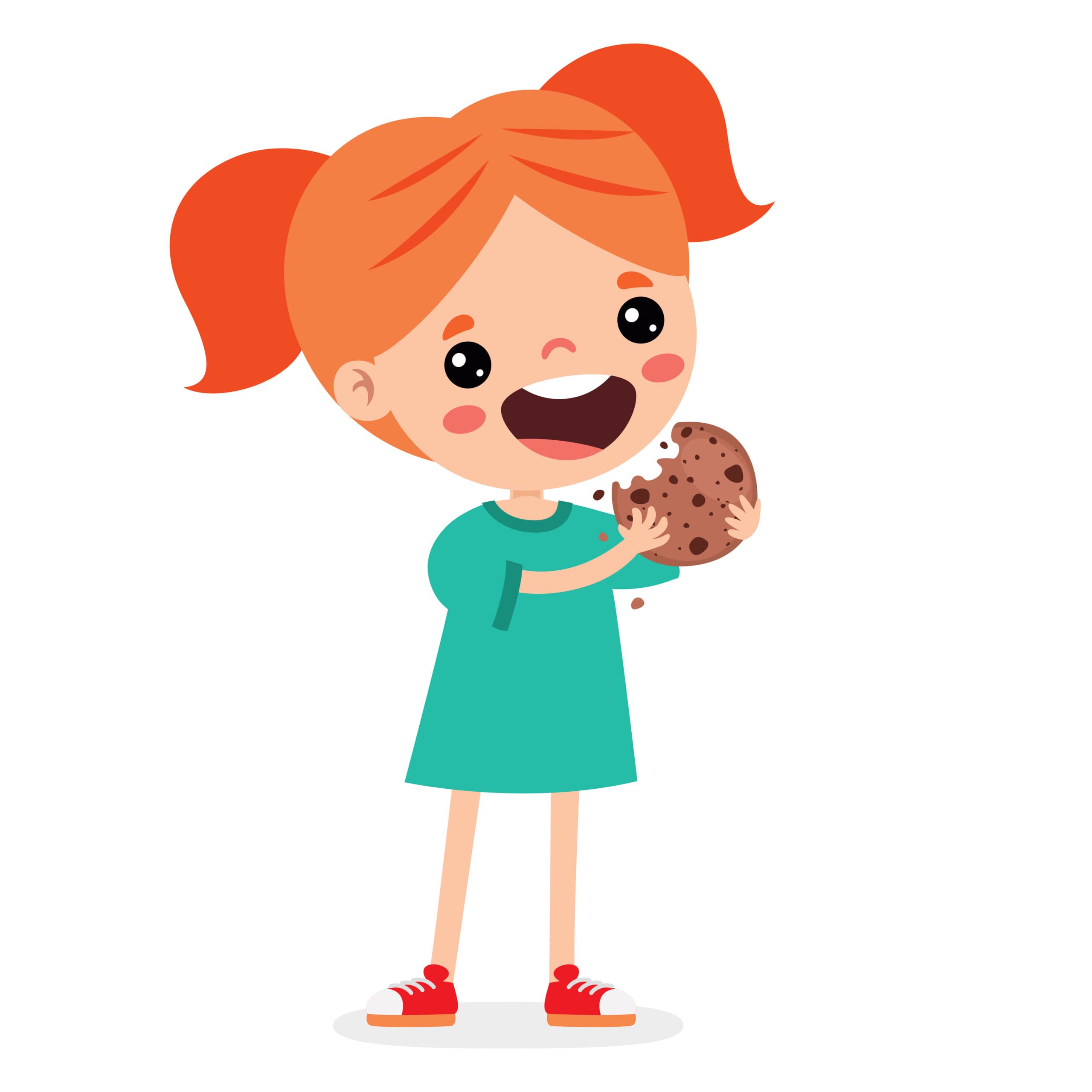 red headed girl eating a cookie