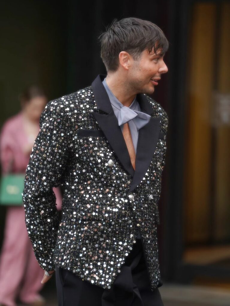 Chris captured by paparazzi outside Harrods